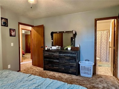 The updated three bedroom three bathroom home on Rita Road is on Ortonville Muni Golf Course in Minnesota - for sale on GolfHomes.com, golf home, golf lot