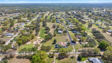 Want to watch the golfers play or enjoy the gorgeous Oak Trees? on Citrus Hills Golf Club in Florida - for sale on GolfHomes.com, golf home, golf lot