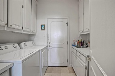 Located in the highly sought-after gated golf community of on De Cordova Bend Country Club in Texas - for sale on GolfHomes.com, golf home, golf lot