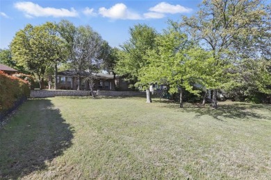 Located in the highly sought-after gated golf community of on De Cordova Bend Country Club in Texas - for sale on GolfHomes.com, golf home, golf lot