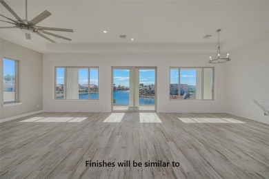 Personalize your dream waterfront home in the exclusive gated on Los Lagos Golf Club in Arizona - for sale on GolfHomes.com, golf home, golf lot