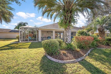 Located in the charming village of Liberty Park, this 3/2 on The Links of Spruce Creek in Florida - for sale on GolfHomes.com, golf home, golf lot