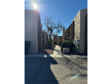 Simple living at its finest!  This ground level, 1 bed/1 full on Chaparral Golf and Country Club in Arizona - for sale on GolfHomes.com, golf home, golf lot