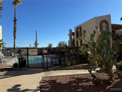 Simple living at its finest!  This ground level, 1 bed/1 full on Chaparral Golf and Country Club in Arizona - for sale on GolfHomes.com, golf home, golf lot