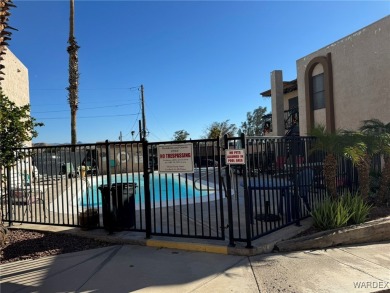 Simple living at its finest!  This ground level, 1 bed/1 full on Chaparral Golf and Country Club in Arizona - for sale on GolfHomes.com, golf home, golf lot