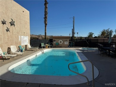 Simple living at its finest!  This ground level, 1 bed/1 full on Chaparral Golf and Country Club in Arizona - for sale on GolfHomes.com, golf home, golf lot