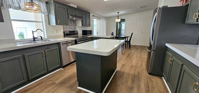 Stunning 3 bedroom 3 bath homewith unique double master on Zephyrhills Municipal Golf Course in Florida - for sale on GolfHomes.com, golf home, golf lot