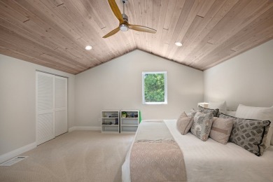 This renovated lakefront home offers comfort, style, and serene on Ocean Reef Club in Florida - for sale on GolfHomes.com, golf home, golf lot