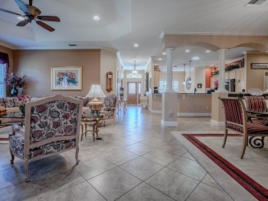 LOVELY CUSTOM EXPANDED WILLIAMSBURG PREMIER home with over 3000 on Palmer Legends Country Club in Florida - for sale on GolfHomes.com, golf home, golf lot
