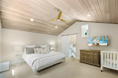This renovated lakefront home offers comfort, style, and serene on Ocean Reef Club in Florida - for sale on GolfHomes.com, golf home, golf lot