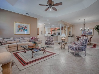 LOVELY CUSTOM EXPANDED WILLIAMSBURG PREMIER home with over 3000 on Palmer Legends Country Club in Florida - for sale on GolfHomes.com, golf home, golf lot