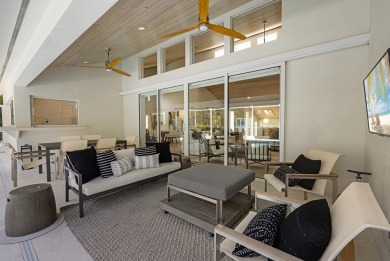 This renovated lakefront home offers comfort, style, and serene on Ocean Reef Club in Florida - for sale on GolfHomes.com, golf home, golf lot