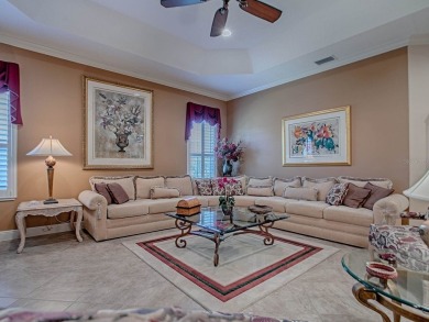 LOVELY CUSTOM EXPANDED WILLIAMSBURG PREMIER home with over 3000 on Palmer Legends Country Club in Florida - for sale on GolfHomes.com, golf home, golf lot
