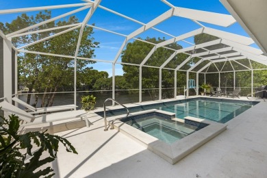 This renovated lakefront home offers comfort, style, and serene on Ocean Reef Club in Florida - for sale on GolfHomes.com, golf home, golf lot