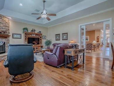 LOVELY CUSTOM EXPANDED WILLIAMSBURG PREMIER home with over 3000 on Palmer Legends Country Club in Florida - for sale on GolfHomes.com, golf home, golf lot