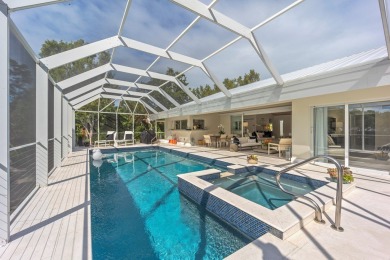 This renovated lakefront home offers comfort, style, and serene on Ocean Reef Club in Florida - for sale on GolfHomes.com, golf home, golf lot