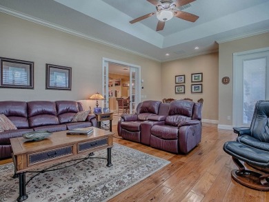 LOVELY CUSTOM EXPANDED WILLIAMSBURG PREMIER home with over 3000 on Palmer Legends Country Club in Florida - for sale on GolfHomes.com, golf home, golf lot