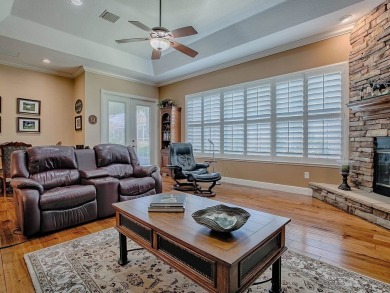 LOVELY CUSTOM EXPANDED WILLIAMSBURG PREMIER home with over 3000 on Palmer Legends Country Club in Florida - for sale on GolfHomes.com, golf home, golf lot