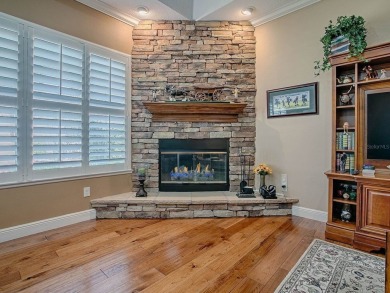LOVELY CUSTOM EXPANDED WILLIAMSBURG PREMIER home with over 3000 on Palmer Legends Country Club in Florida - for sale on GolfHomes.com, golf home, golf lot