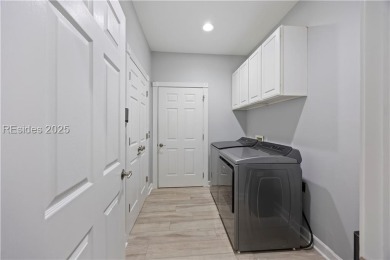 Discover refined Lowcountry living in this beautifully updated on Palmetto Hall Golf Course in South Carolina - for sale on GolfHomes.com, golf home, golf lot