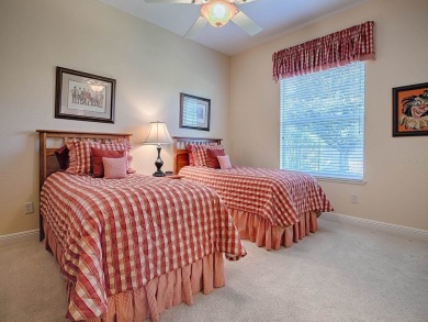 LOVELY CUSTOM EXPANDED WILLIAMSBURG PREMIER home with over 3000 on Palmer Legends Country Club in Florida - for sale on GolfHomes.com, golf home, golf lot