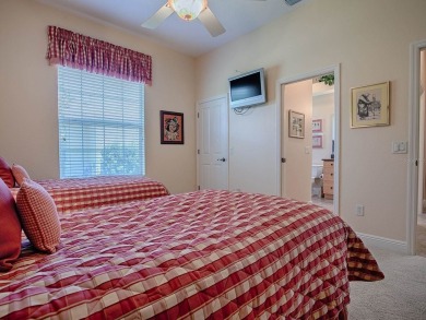 LOVELY CUSTOM EXPANDED WILLIAMSBURG PREMIER home with over 3000 on Palmer Legends Country Club in Florida - for sale on GolfHomes.com, golf home, golf lot