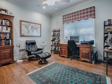 LOVELY CUSTOM EXPANDED WILLIAMSBURG PREMIER home with over 3000 on Palmer Legends Country Club in Florida - for sale on GolfHomes.com, golf home, golf lot