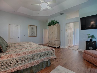 LOVELY CUSTOM EXPANDED WILLIAMSBURG PREMIER home with over 3000 on Palmer Legends Country Club in Florida - for sale on GolfHomes.com, golf home, golf lot