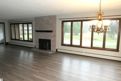 A golfer's dream! This beautiful 3-bedroom 2-bathroom home is on The Links At Edmore in Michigan - for sale on GolfHomes.com, golf home, golf lot