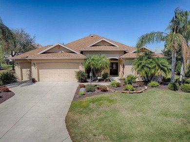 LOVELY CUSTOM EXPANDED WILLIAMSBURG PREMIER home with over 3000 on Palmer Legends Country Club in Florida - for sale on GolfHomes.com, golf home, golf lot
