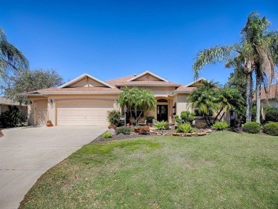 LOVELY CUSTOM EXPANDED WILLIAMSBURG PREMIER home with over 3000 on Palmer Legends Country Club in Florida - for sale on GolfHomes.com, golf home, golf lot