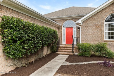 Step inside 7919 Trap Way and you're immediately welcomed into a on Masonboro Country Club in North Carolina - for sale on GolfHomes.com, golf home, golf lot