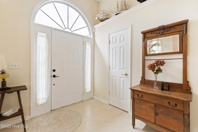 Step inside 7919 Trap Way and you're immediately welcomed into a on Masonboro Country Club in North Carolina - for sale on GolfHomes.com, golf home, golf lot
