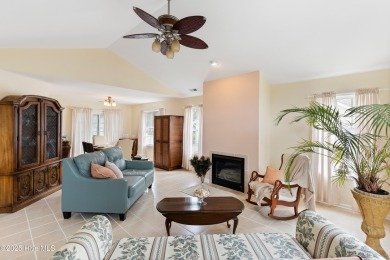 Step inside 7919 Trap Way and you're immediately welcomed into a on Masonboro Country Club in North Carolina - for sale on GolfHomes.com, golf home, golf lot