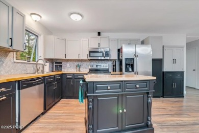 Fully remodeled 4-Bedroom Home in Tanglwood Lakes with Lake on Paupack Hills Golf and Country Club in Pennsylvania - for sale on GolfHomes.com, golf home, golf lot