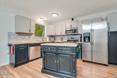 Fully remodeled 4-Bedroom Home in Tanglwood Lakes with Lake on Paupack Hills Golf and Country Club in Pennsylvania - for sale on GolfHomes.com, golf home, golf lot