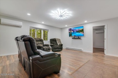 Fully remodeled 4-Bedroom Home in Tanglwood Lakes with Lake on Paupack Hills Golf and Country Club in Pennsylvania - for sale on GolfHomes.com, golf home, golf lot