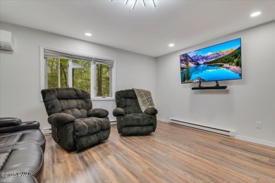 Fully remodeled 4-Bedroom Home in Tanglwood Lakes with Lake on Paupack Hills Golf and Country Club in Pennsylvania - for sale on GolfHomes.com, golf home, golf lot