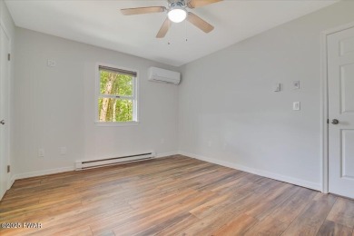 Fully remodeled 4-Bedroom Home in Tanglwood Lakes with Lake on Paupack Hills Golf and Country Club in Pennsylvania - for sale on GolfHomes.com, golf home, golf lot