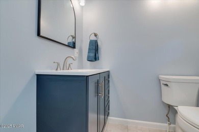 Fully remodeled 4-Bedroom Home in Tanglwood Lakes with Lake on Paupack Hills Golf and Country Club in Pennsylvania - for sale on GolfHomes.com, golf home, golf lot