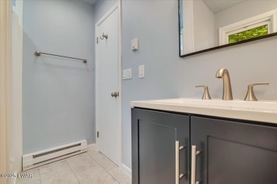 Fully remodeled 4-Bedroom Home in Tanglwood Lakes with Lake on Paupack Hills Golf and Country Club in Pennsylvania - for sale on GolfHomes.com, golf home, golf lot