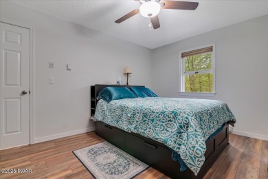 Fully remodeled 4-Bedroom Home in Tanglwood Lakes with Lake on Paupack Hills Golf and Country Club in Pennsylvania - for sale on GolfHomes.com, golf home, golf lot