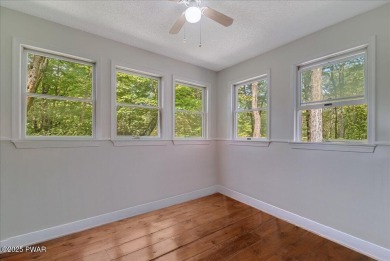 Fully remodeled 4-Bedroom Home in Tanglwood Lakes with Lake on Paupack Hills Golf and Country Club in Pennsylvania - for sale on GolfHomes.com, golf home, golf lot