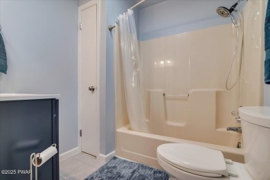Fully remodeled 4-Bedroom Home in Tanglwood Lakes with Lake on Paupack Hills Golf and Country Club in Pennsylvania - for sale on GolfHomes.com, golf home, golf lot
