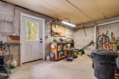 Fully remodeled 4-Bedroom Home in Tanglwood Lakes with Lake on Paupack Hills Golf and Country Club in Pennsylvania - for sale on GolfHomes.com, golf home, golf lot
