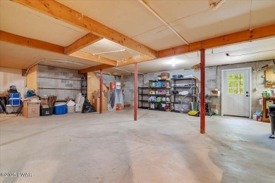 Fully remodeled 4-Bedroom Home in Tanglwood Lakes with Lake on Paupack Hills Golf and Country Club in Pennsylvania - for sale on GolfHomes.com, golf home, golf lot