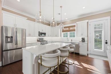 Charleston inspired architecture in Litchfield Plantation. This on Willbrook Plantation Golf Club in South Carolina - for sale on GolfHomes.com, golf home, golf lot