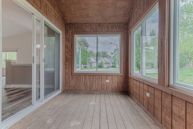 Absolutely beautiful Woodland Green end unit ranch with sunny on Fox Lake Country Club, Inc. in Illinois - for sale on GolfHomes.com, golf home, golf lot