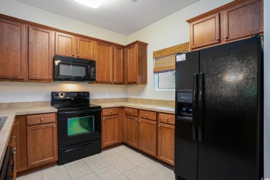 This is a beautifully maintained 2-bedroom, 2-bathroom condo on Barefoot Resort and Golf Club  in South Carolina - for sale on GolfHomes.com, golf home, golf lot