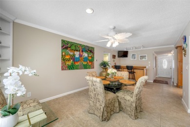 This updated home offers one of the most stunning views in all on Highland Lakes Executive Golf Course in Florida - for sale on GolfHomes.com, golf home, golf lot